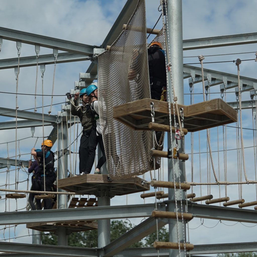 People on a raised activity course